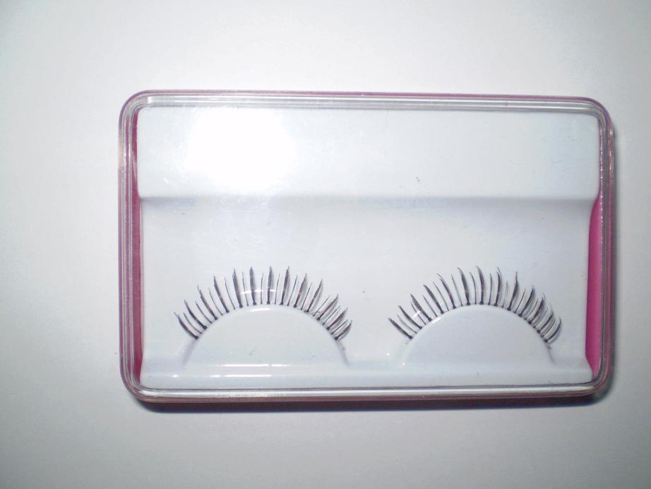 Under pair of eyelash